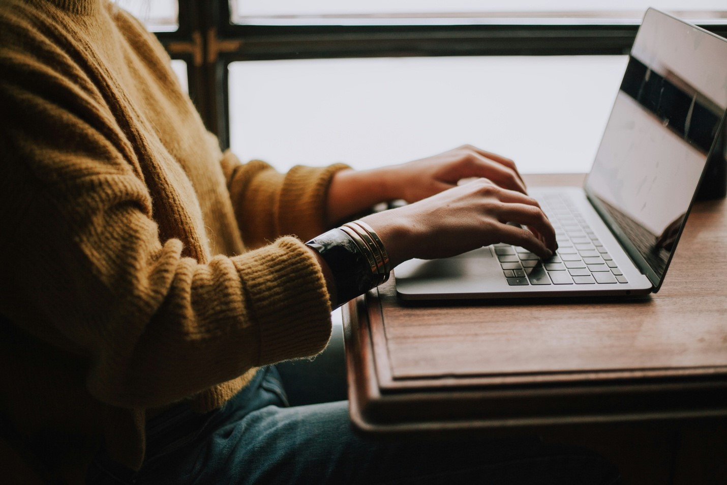 User enjoying unrestricted Internet access on their laptop, free from ISP throttling.